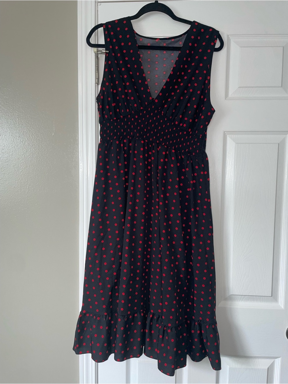 Sleeveless Black Midi Dress with Red Polka Dots